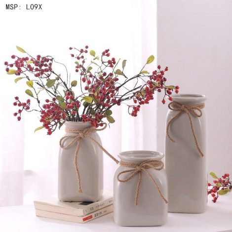 Lọ hoa sứ màu xám buộc nơ